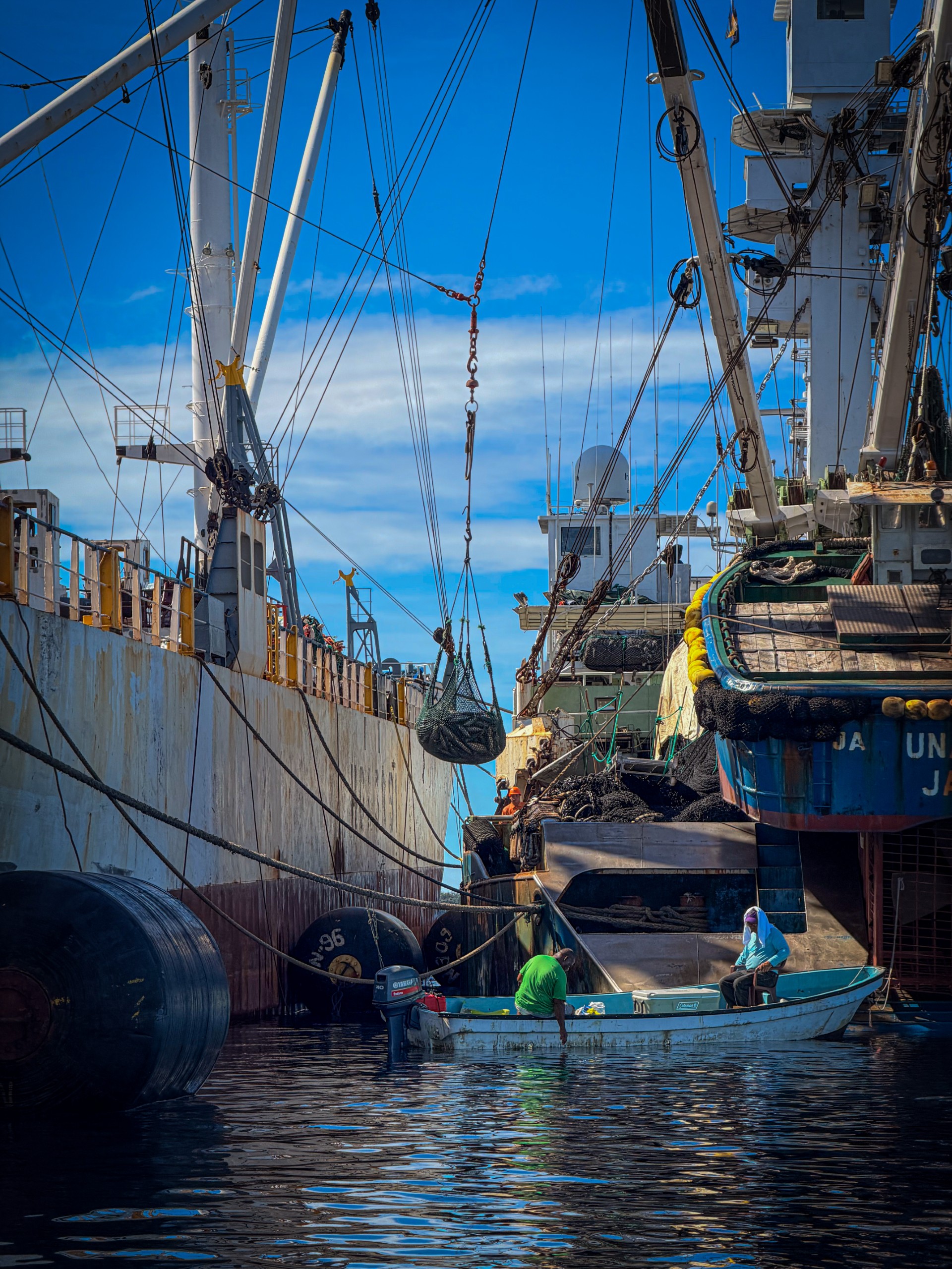 Local Fishermen fishing among Purse Seiners